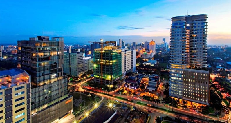 An aerial view of Cebu City, specifically the Cebu IT Park, featuring big and tall buildings that house multinational companies and outsourcing firms.