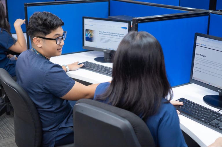 A group of call centre agents/nurses from Select VoiceCom during work hours inside a Philippine call centre office.